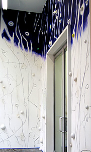 Wall Painting , 2007, acrylic paint, charcoal, wooden balls, and spray paint on wall- east, north walls 
