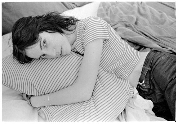 Judy Linn, Patti hugs pillow, early 1970s jlf7034
